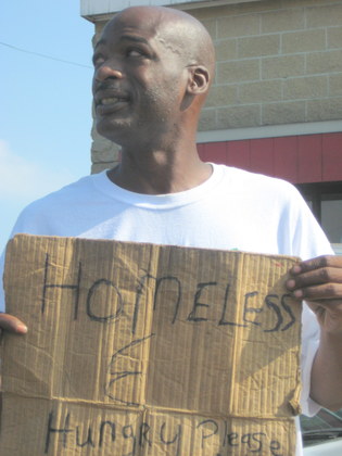 roosevelt%20watkins%20with%20sign.JPG
