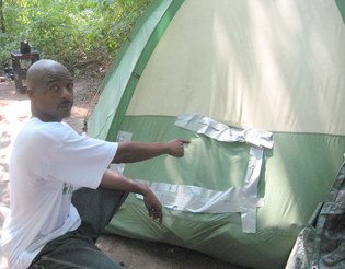 roosevelt%20with%20rip%20in%20tent.JPG